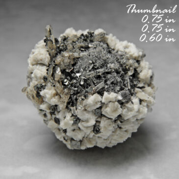 Garnet (Pseudomorphed (replace) by hematite) with Bixbyite, Topaz and Feldspar ? Location: Thomas Range, Juab Co., Utah.   BOX03